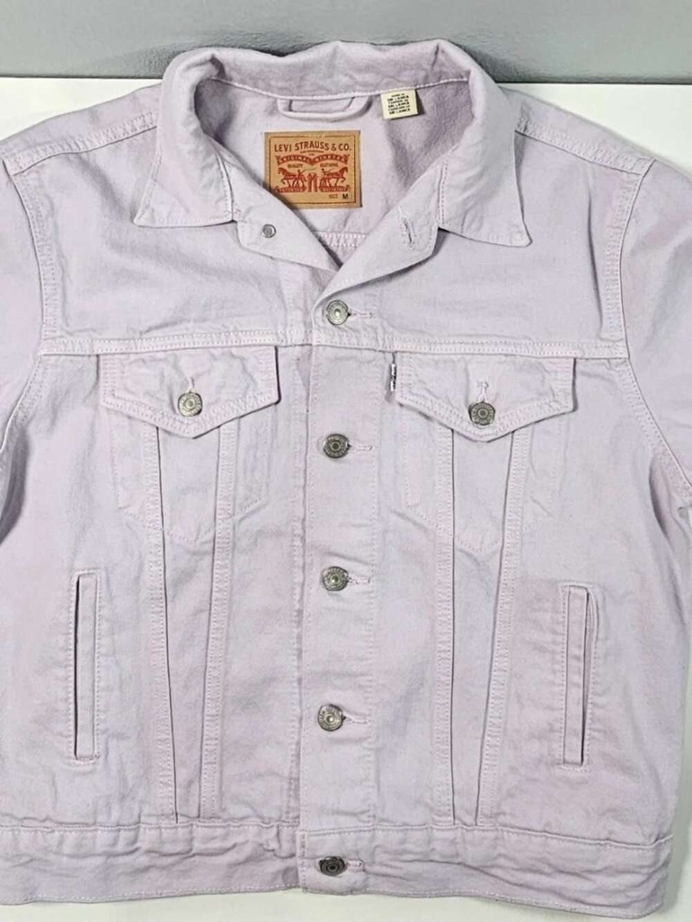 Levi's original trucker jacket in light lavender purple denim. Men's Size M